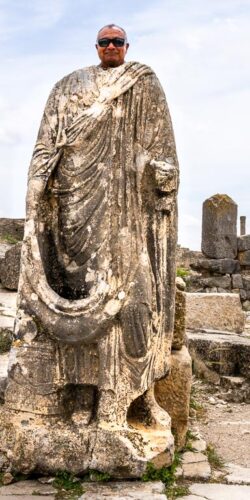 The Romans were efficient with their statues. They made one body for the emperor and a new head for each new emperor. This was Sami's turn to be emperor.